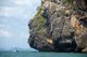 Thailand: Ko Tarutao Marine National Park, rocky cliffs near Ko Tarutao, boat